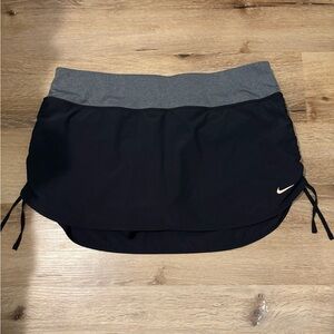 Nike DRI-FIT Athletic Mini Skort with Adjustable Side Ties in Black & Gray